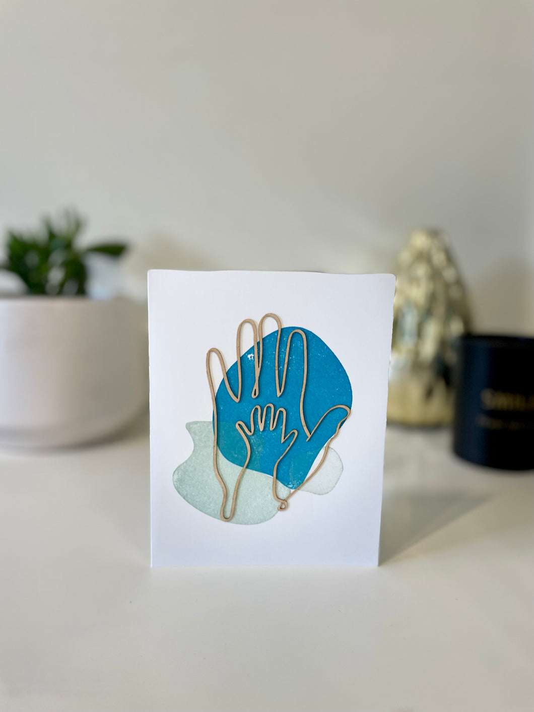 Hands greeting card with wooden design