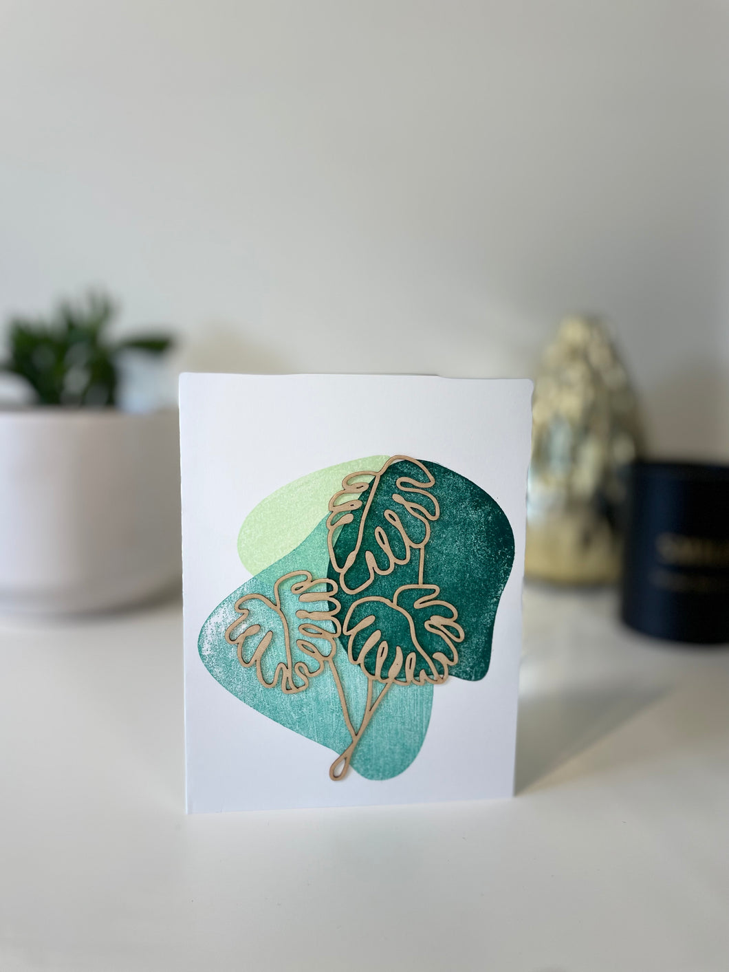 Monstera greeting card with wooden design