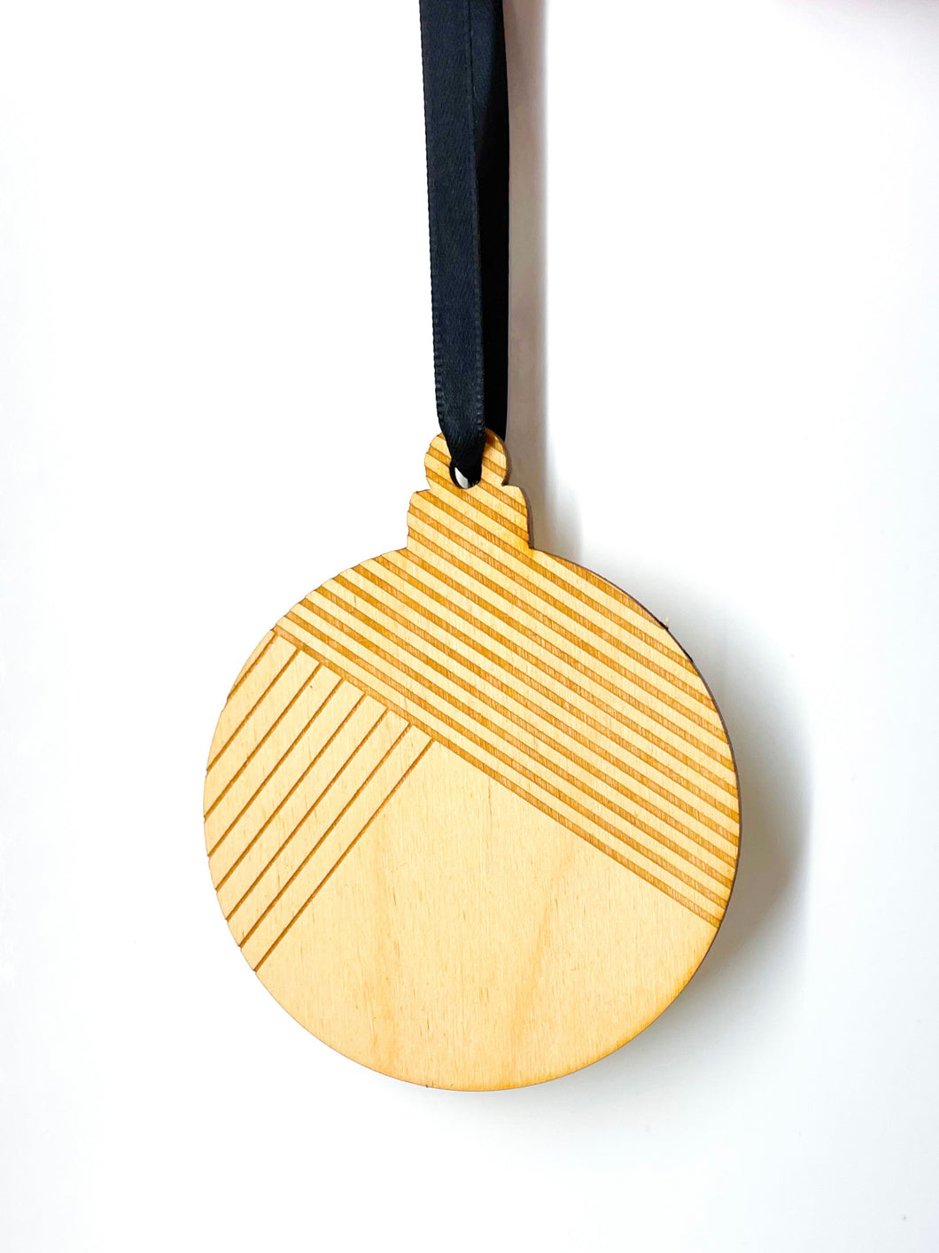 Wood ornament with lines